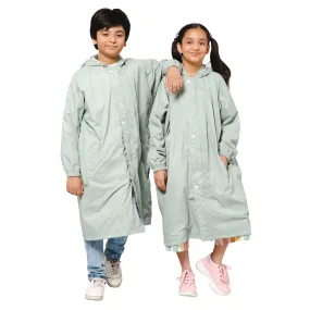 THE CLOWNFISH Cloud Chaser Series Kids Raincoat Waterproof Polyester Double Coating Reversible Longcoat with Hood and Reflector Logo at Back. Printed Plastic Pouch. Kid Age-11-12 years (Pista Green)