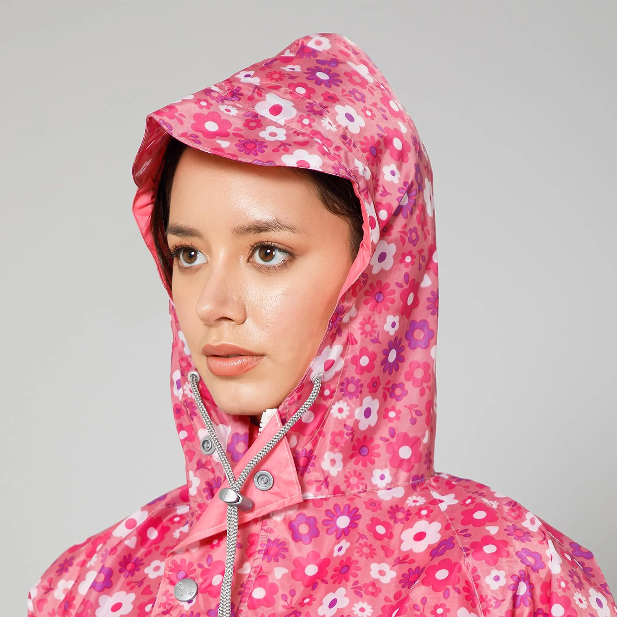 THE CLOWNFISH Polyester Waterproof Rain Coat For Women Skirt and Top Raincoat With Adjustable Hood and Front Pockets Rain Glam Series (Pink Floral, X-Large)